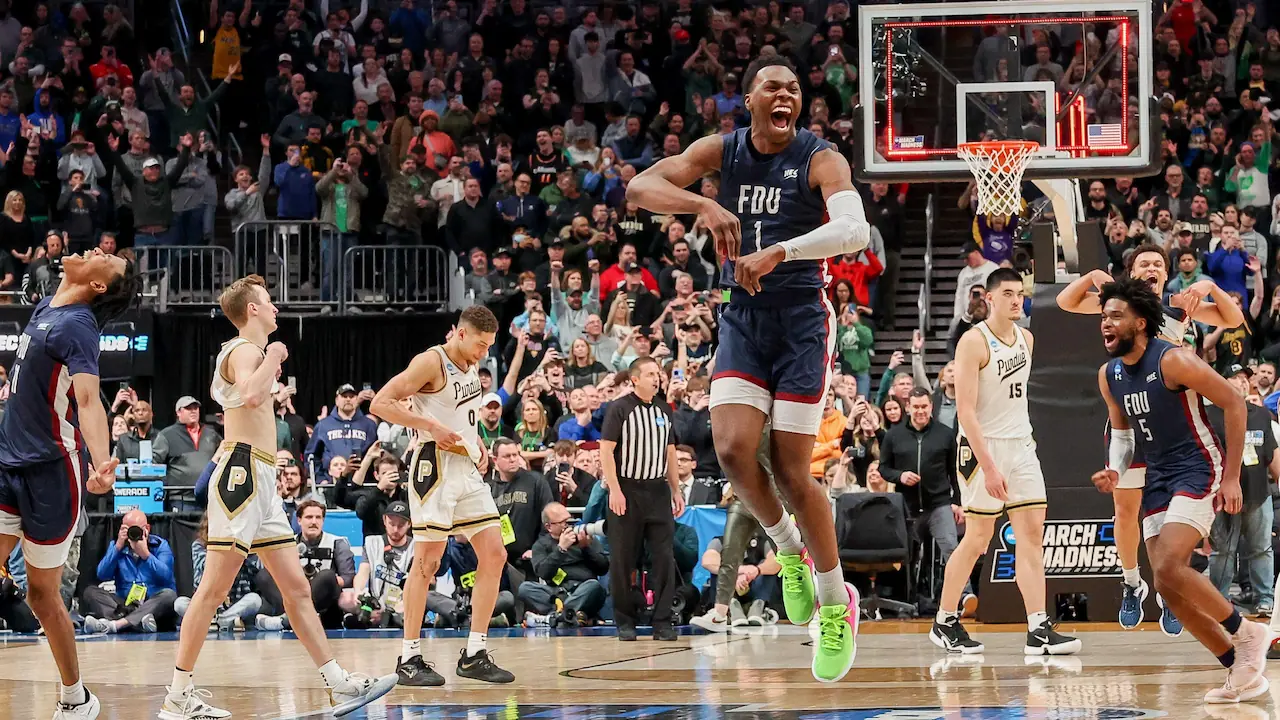 Fairleigh Dickinson players celebrate after beating favorites Purdue in the first round of March Madness.