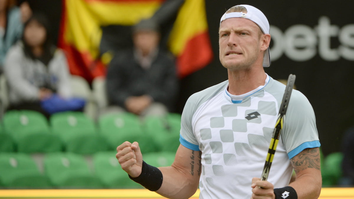 Sam Groth, Australian tennis player, celebrates winning a match.