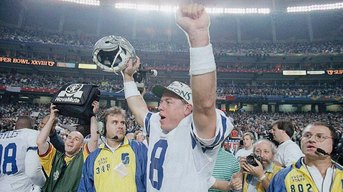 Troy Aikman celebrates winning the Super Bowl for the Dallas Cowboys over the Bills.