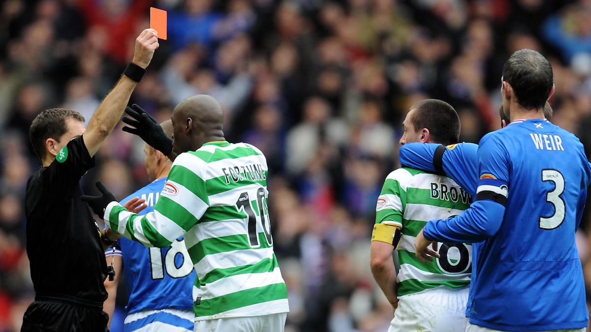 Celtic and Rangers players confront one another in the Glasgow Derby.