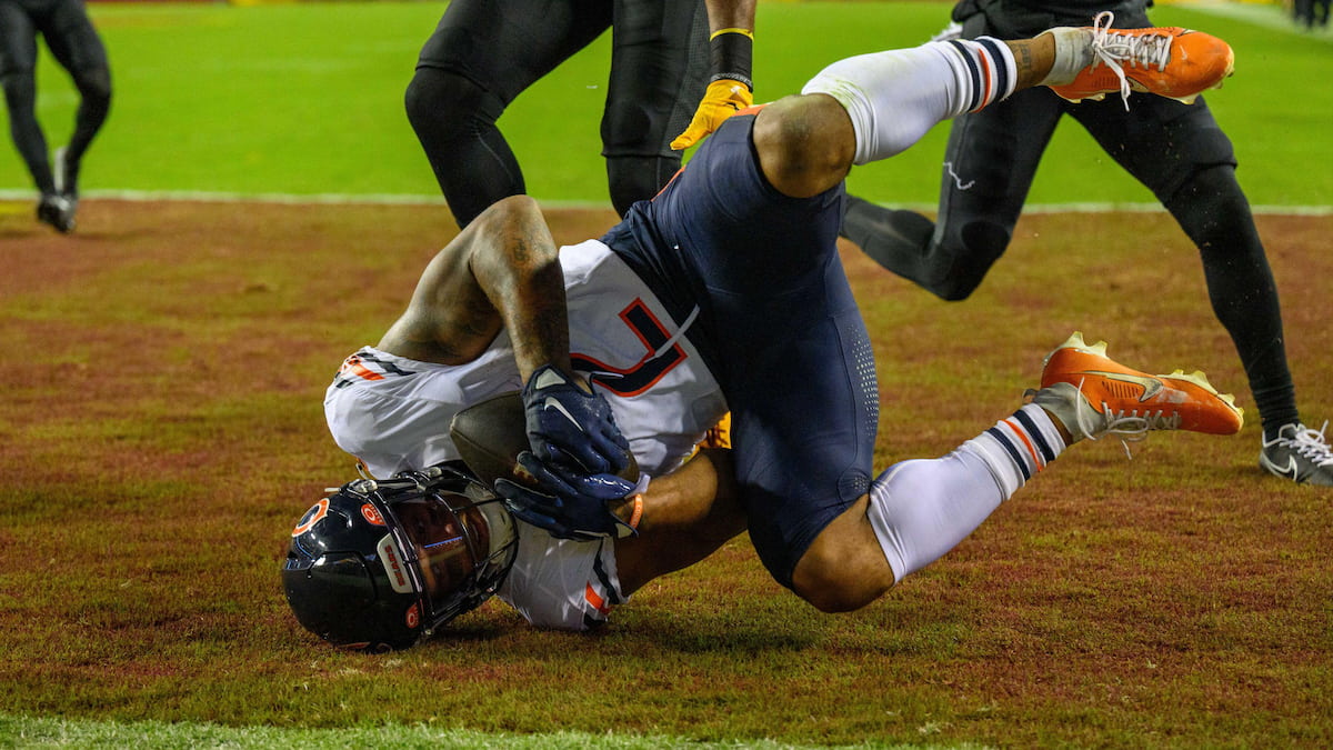 DJ Moore scores a touchdown for the Chicago Bears against Washington in 2003.