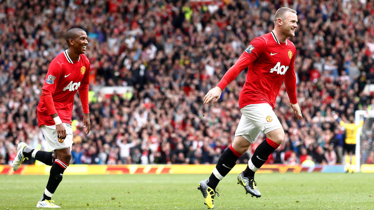 Wayne Rooney celebrates scoring for Manchester United versus Arsenal.