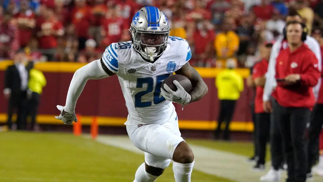 Jahmyr Gibbs running for a long gain for the Detroit Lions.