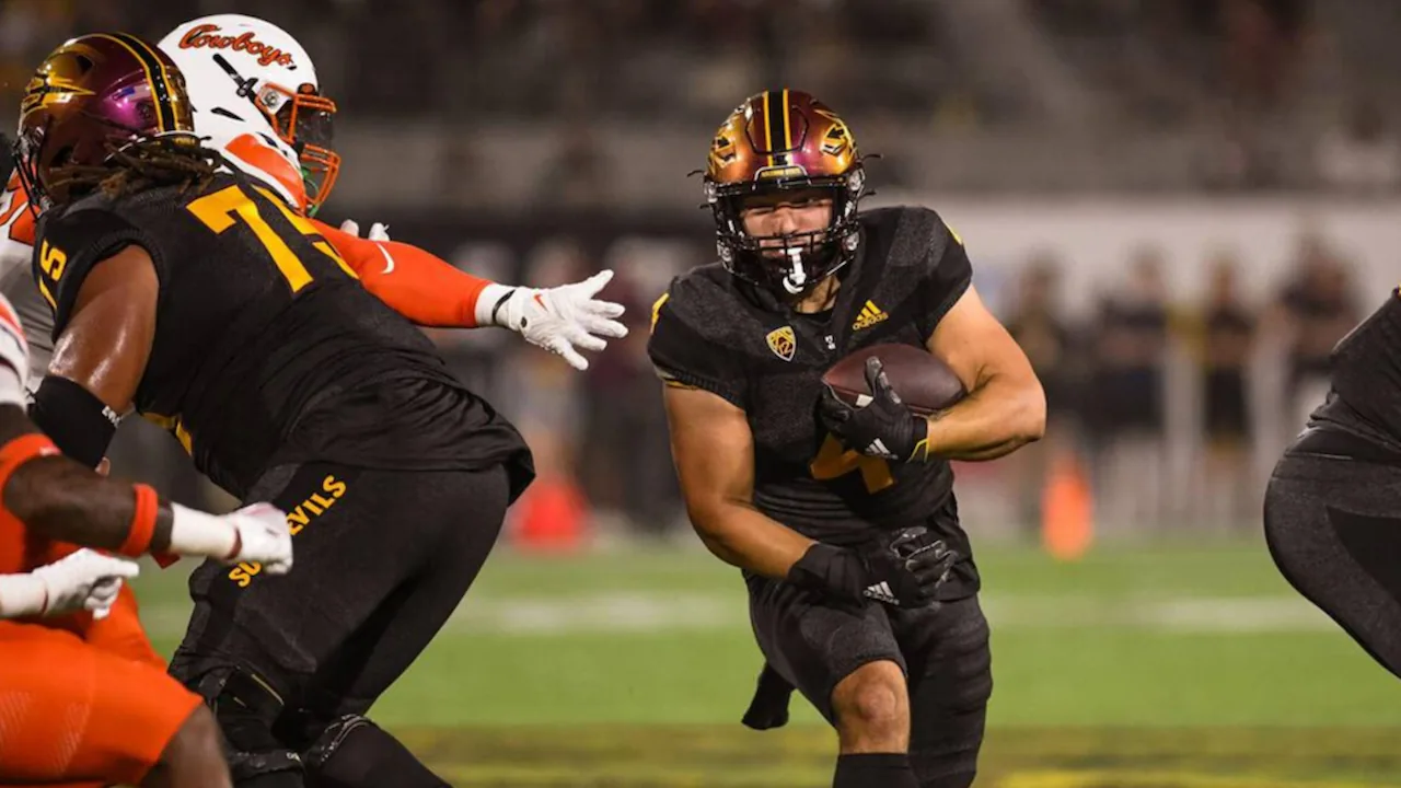 Cam Skattebo playing running back for the Arizona State Sun Devils.