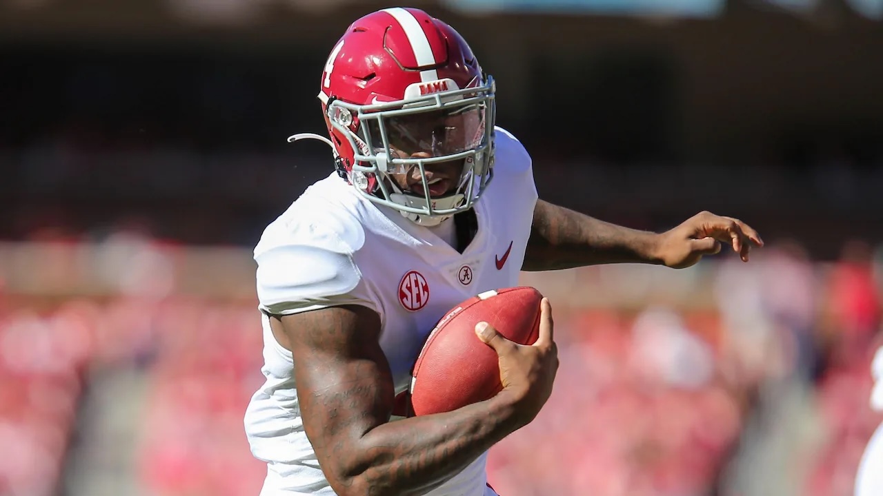 Jalen Milroe playing QB for Alabama.