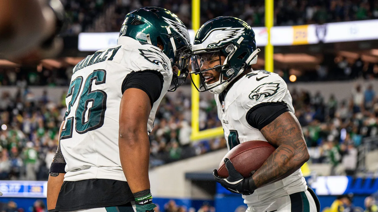 Saquon Barkley scoring a TD for the Philadelphia Eagles.